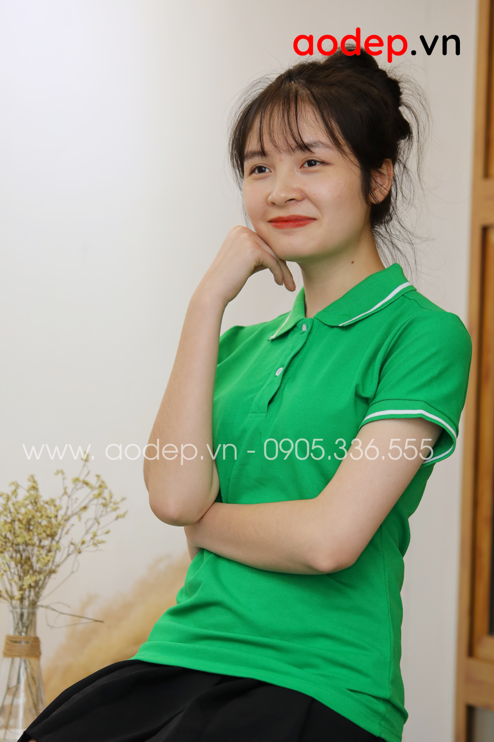 ​Áo thun polo màu xanh lá